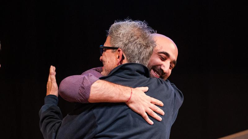 masterschool pitch awards show two men hugging