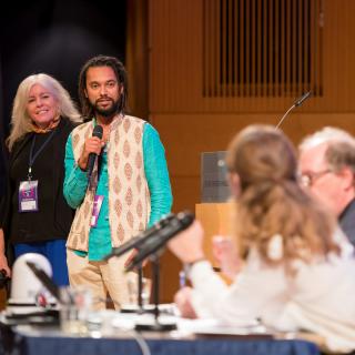 Two filmmakers pitch to a panel